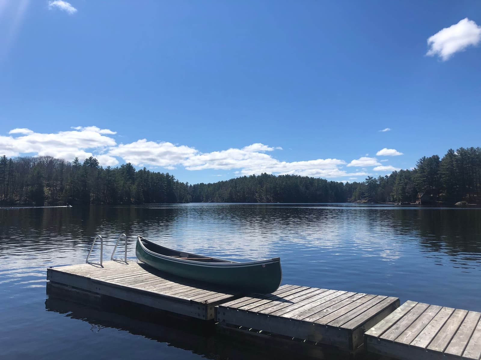 Mirror-calm Muskoka lake